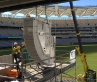 One of the 18 line array sub structures is assembled on a temporary scaffold above the L1 seats